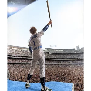 Elton John standing on a piano (colourised), 1975 — Limited Edition Print by Terry O'Neill