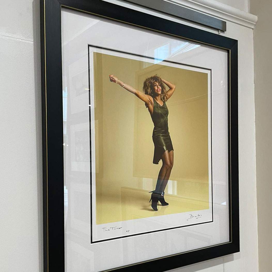 Tina Turner - limited edition print by Brian Aris presented in a black and gold frame