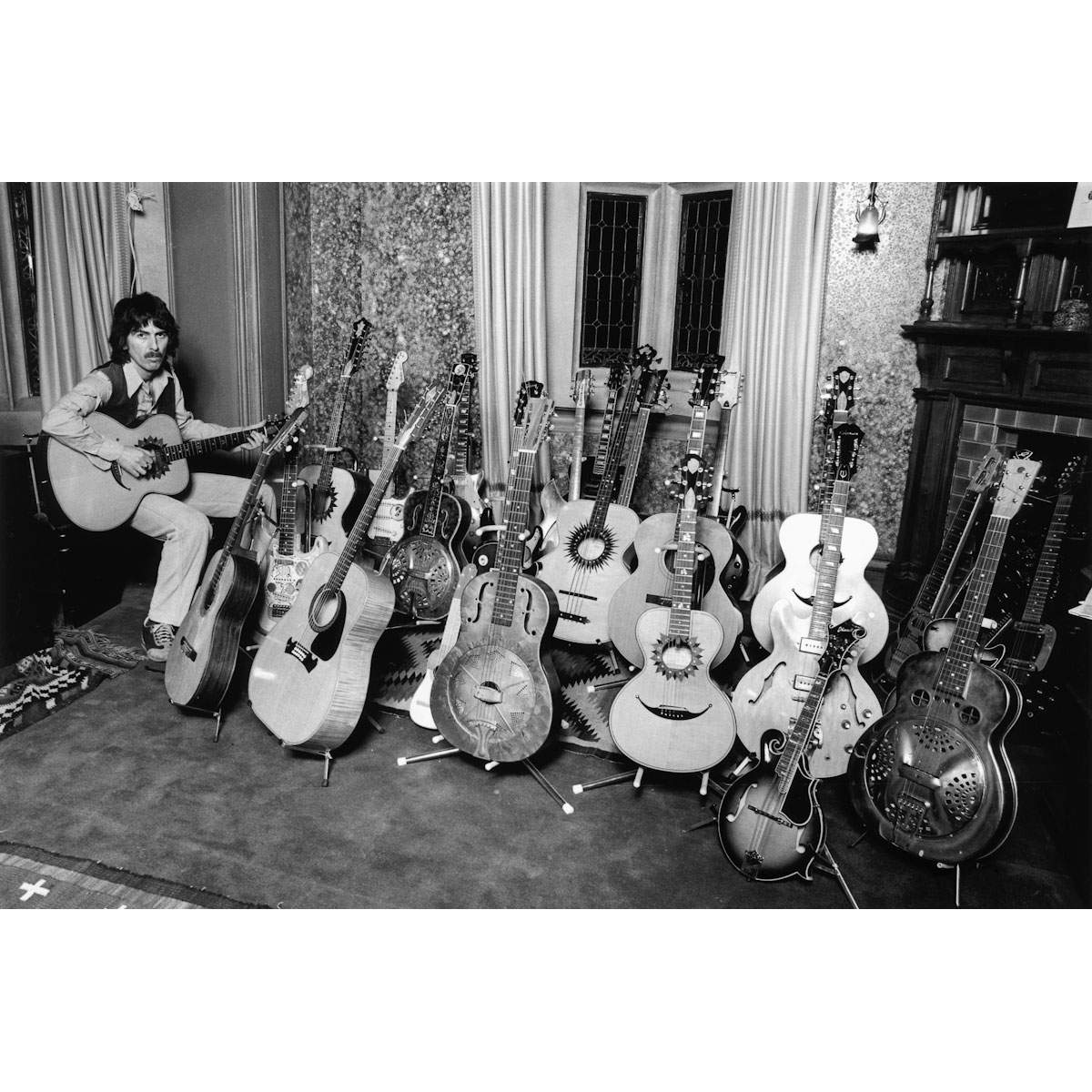 limited edition print of George Harrison with Guitars by Brian Aris