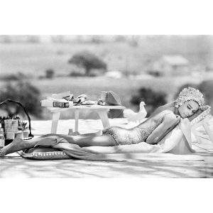 Audrey Hepburn lounging by the pool, 1967 — Limited Edition Print by Terry O'Neill